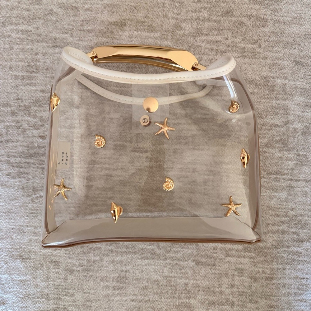 One a Day Clear Gold-Accented Seashell Women's clear Bag